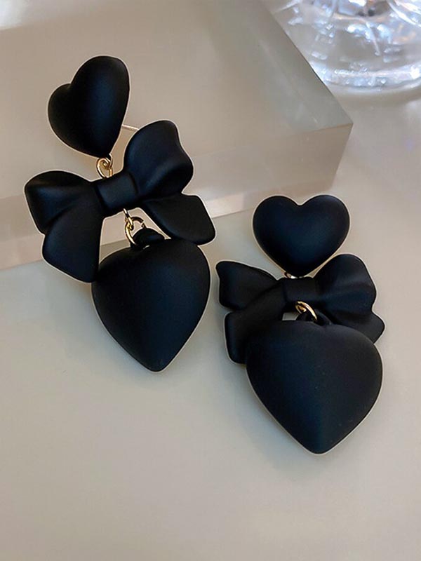 czarne duże kolczyki serca i kokardka